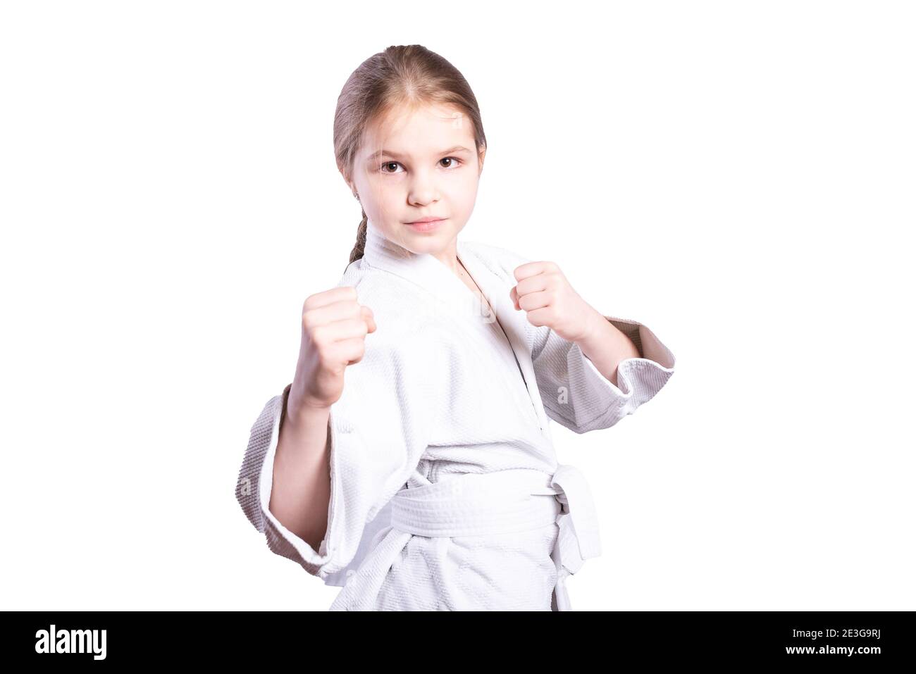 Girl in a kimono judo. In a fighting stance. Isolated on white background.  High quality photo Stock Photo - Alamy