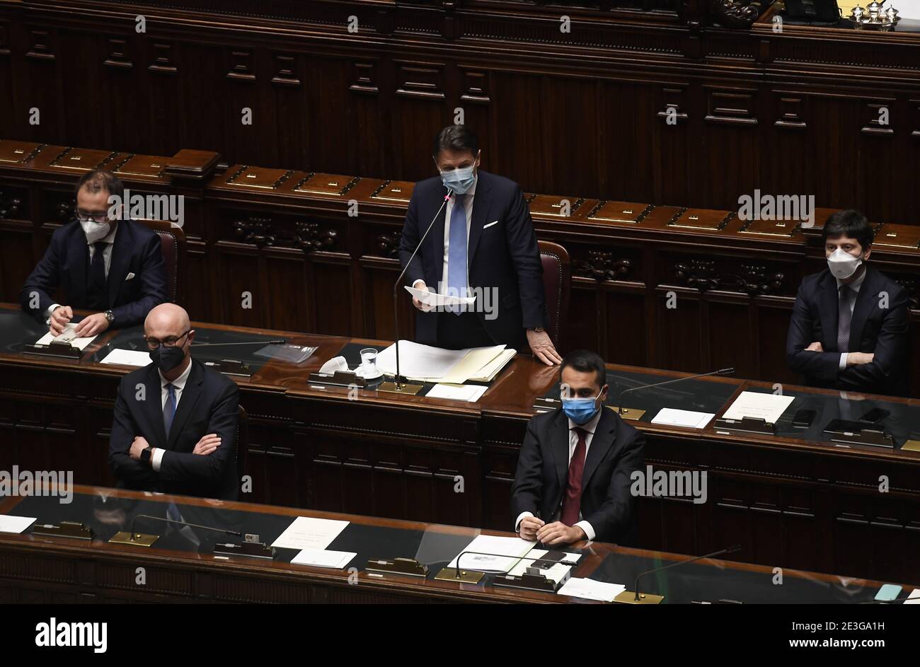 Rome. 19th Jan, 2021. Italian Prime Minister Giuseppe Conte (C) addresses the lower house of Parliament in Rome, Italy, on Jan. 18, 2021. Italian Prime Minister Giuseppe Conte won a confidence vote at the Lower House of Parliament on Monday by 321 in favor, 259 against and 27 abstaining. Conte sought the confidence vote after former Prime Minister Matteo Renzi, now a senator who leads the Italia Viva party, pulled out of the ruling majority last week, sparking a government crisis. Credit: Xinhua/Alamy Live News Stock Photo