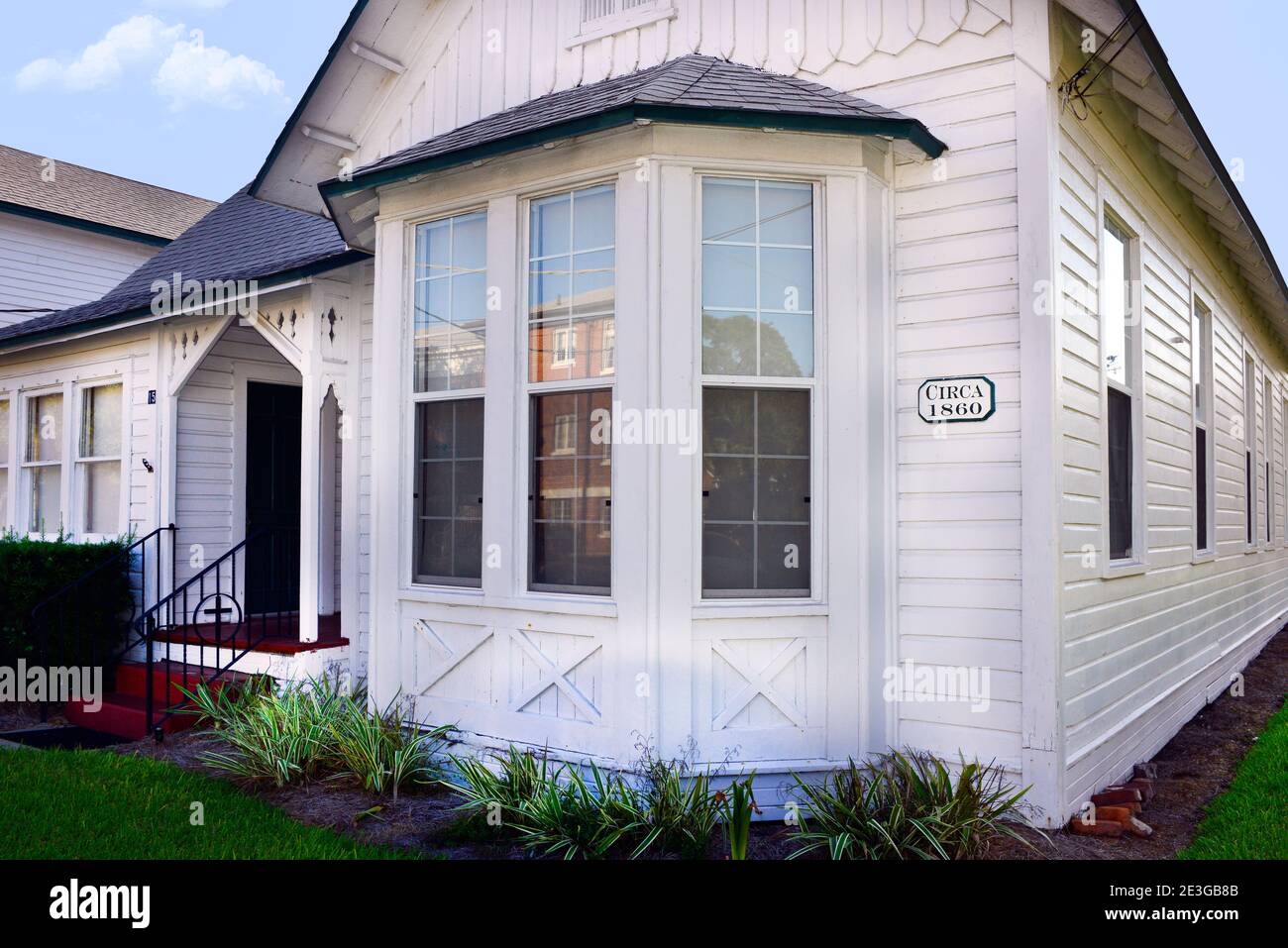Historical wooden building made in an old Florida craftsman style with religious overtones, and marked with sign: circa 1860, in Fernandina Beach, FL Stock Photo