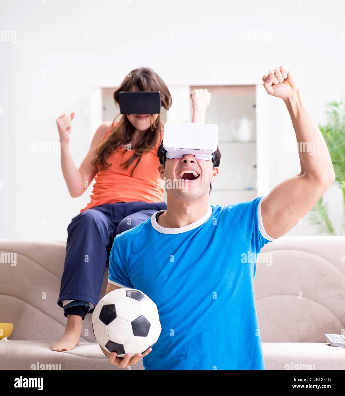 The man watching football on virtual reality vr glasses Stock Photo Alamy