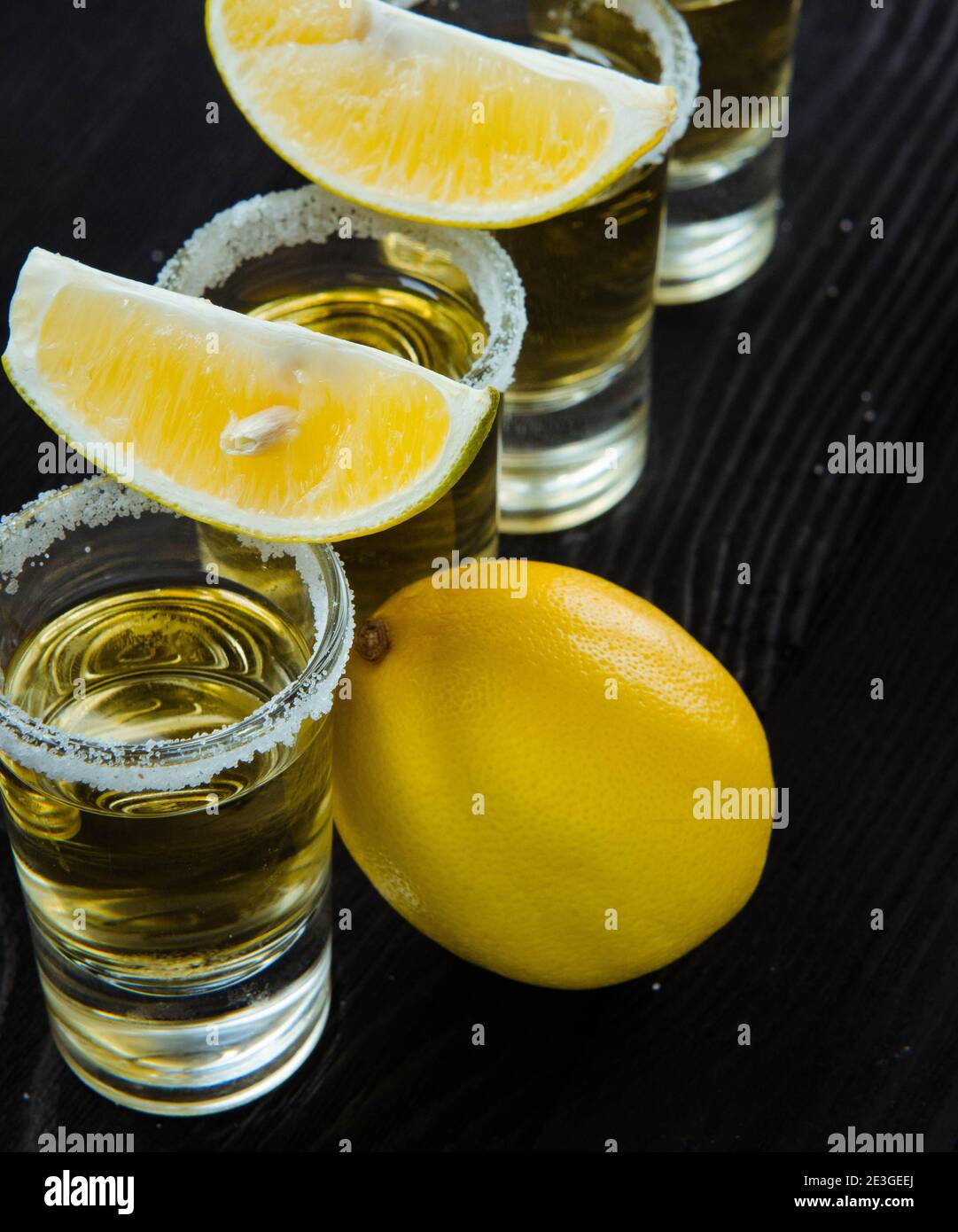 The tequila drink served in glasses with lime and salt Stock Photo - Alamy