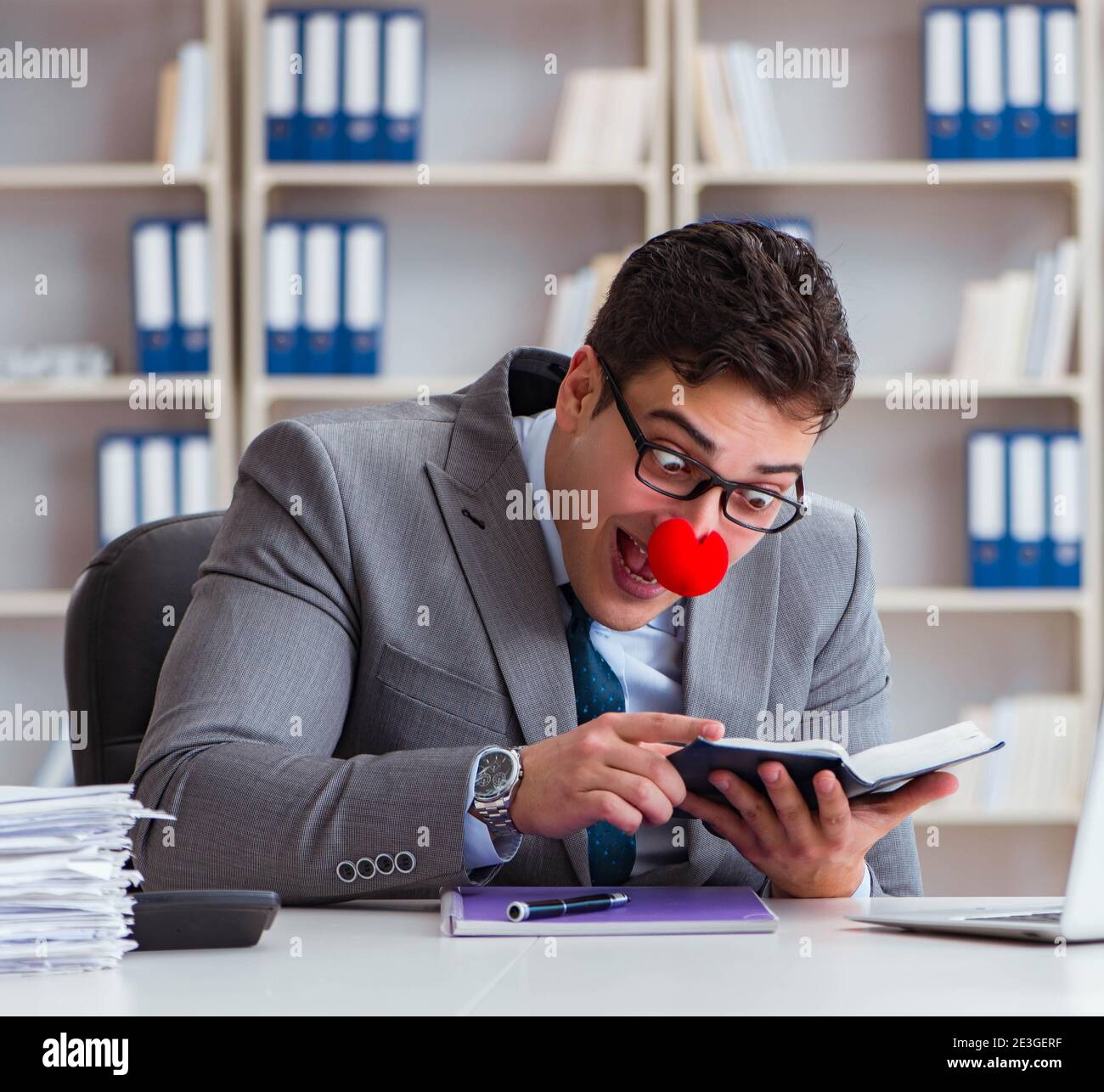 Work Cloan The clown businessman working in the office Stock Photo - Alamy