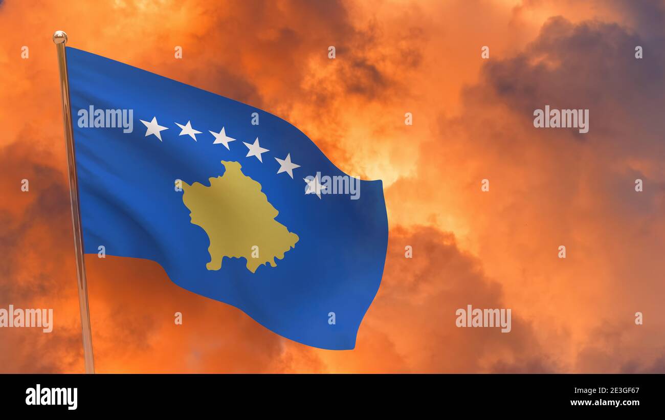 Kosovo flag on pole. Dramatic background. National flag of Kosovo Stock Photo