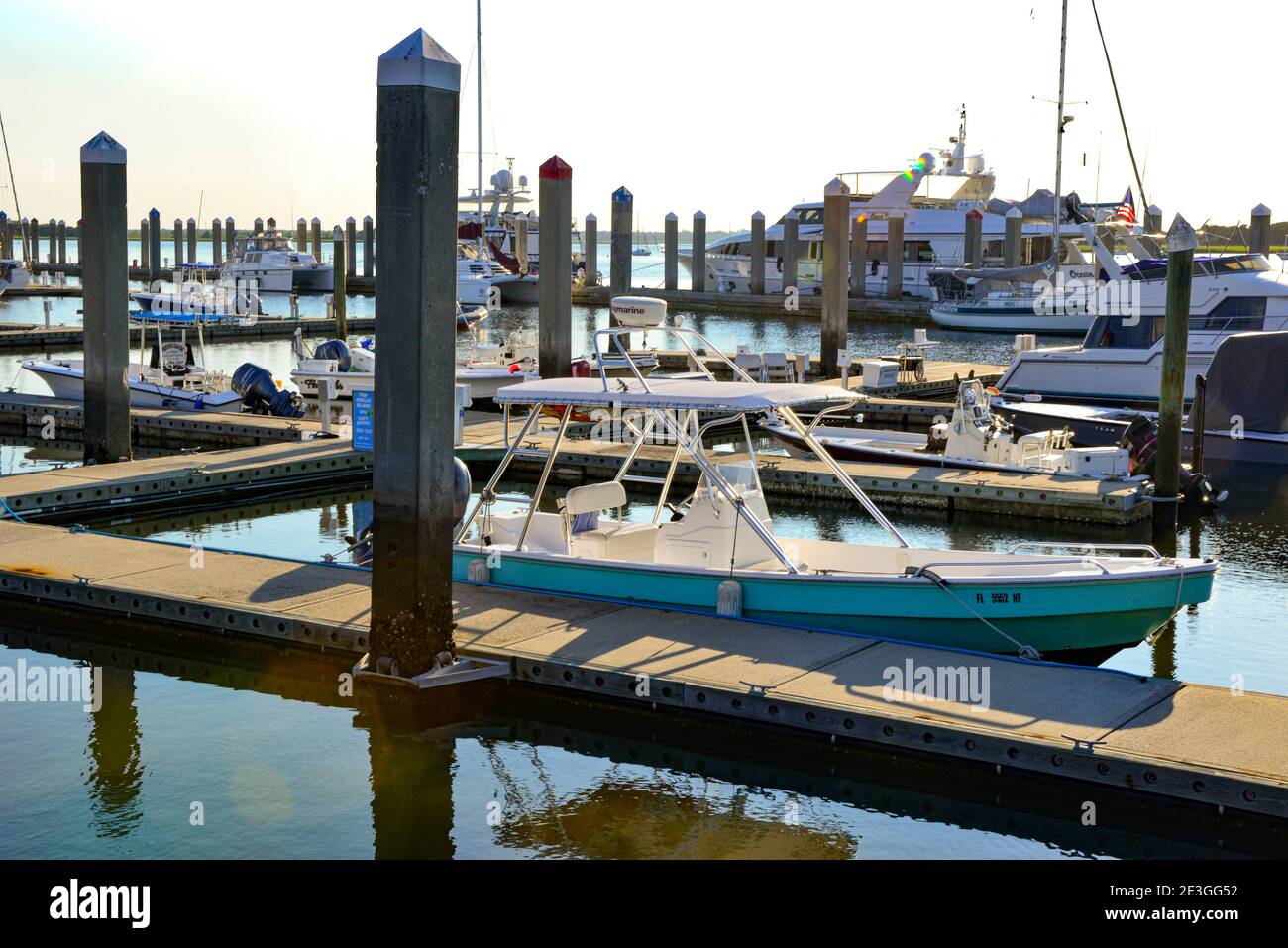 View from a deck of Floating concrete docks accommodating yachts, sailboats and motorboats at the Oasis Marina at Fernandina Harbor, Amelia Island, FL Stock Photo