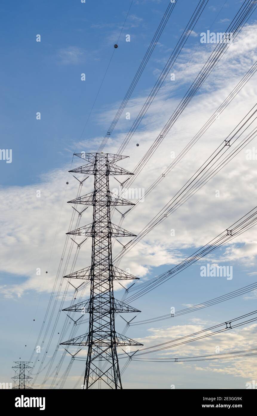 Hight Voltage Pole and the Blue Sky with Clouds Stock Photo - Alamy