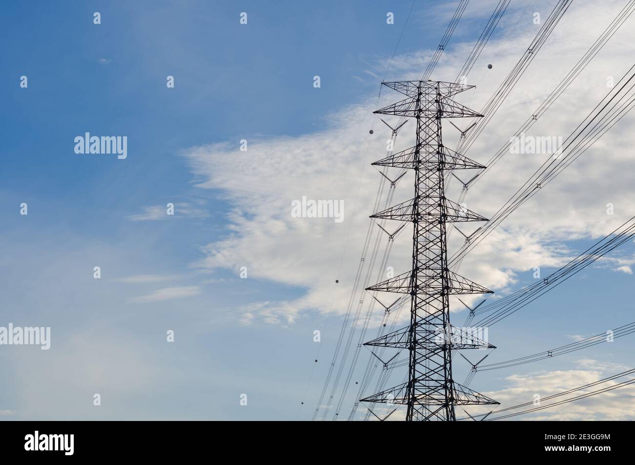 Hight Voltage Pole and the Blue Sky with Clouds Stock Photo - Alamy