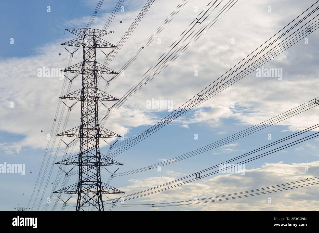 Hight Voltage Pole and the Blue Sky with Clouds Stock Photo - Alamy