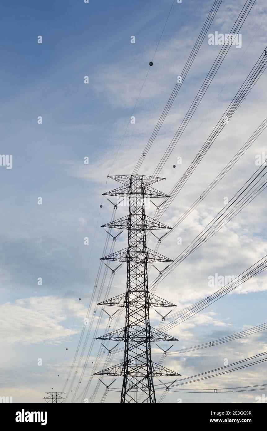 Hight Voltage Pole and the Blue Sky with Clouds Stock Photo - Alamy