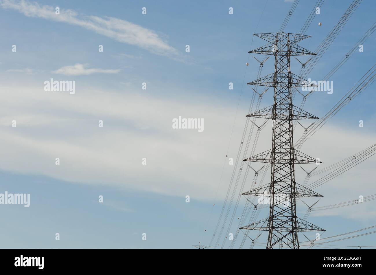 Hight Voltage Pole and the Blue Sky with Clouds Stock Photo - Alamy