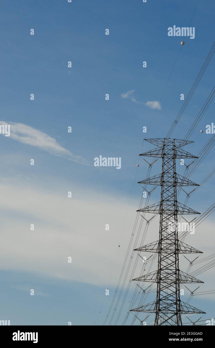 Hight Voltage Pole and the Blue Sky with Clouds Stock Photo - Alamy