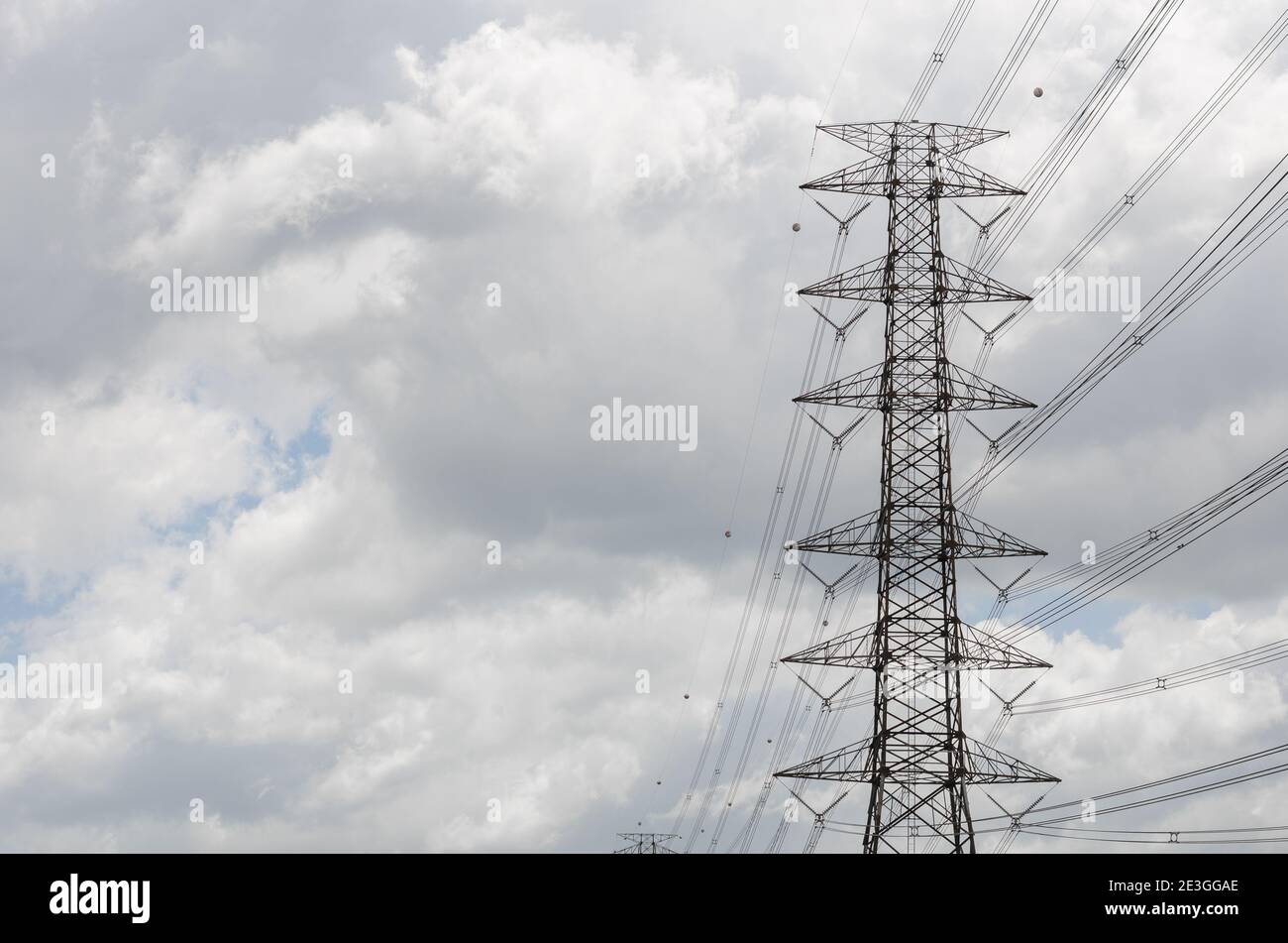 Hight Voltage Pole and the Blue Sky with Clouds Stock Photo - Alamy