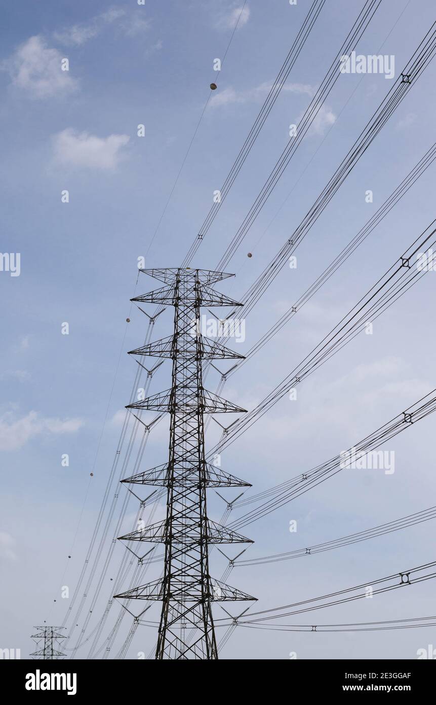 Hight Voltage Pole and the Blue Sky with Clouds Stock Photo - Alamy