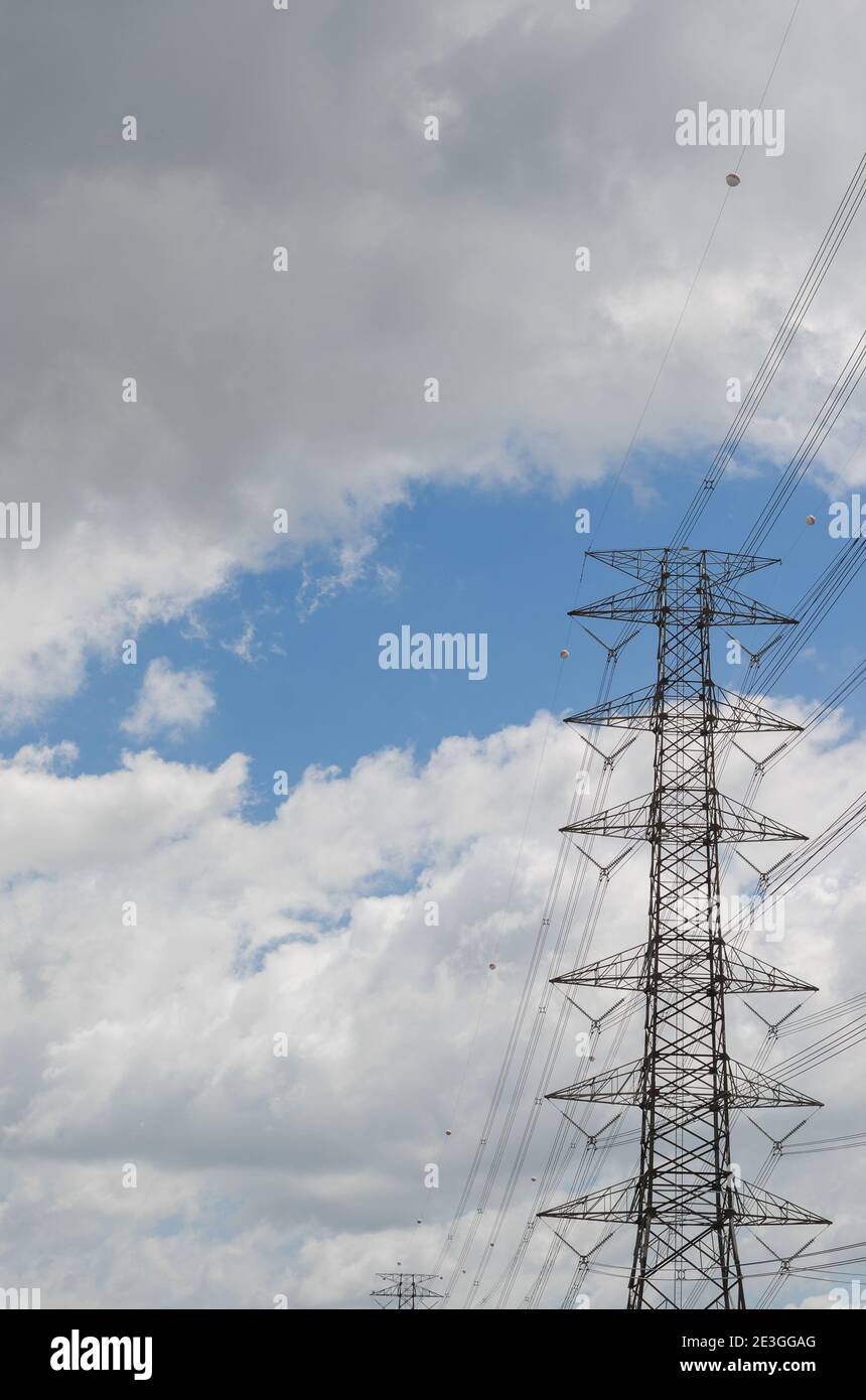 Hight Voltage Pole and the Blue Sky with Clouds Stock Photo - Alamy