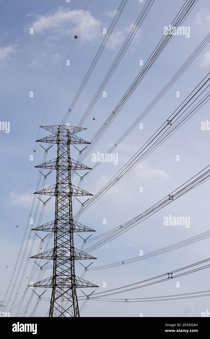 Hight Voltage Pole and the Blue Sky with Clouds Stock Photo - Alamy