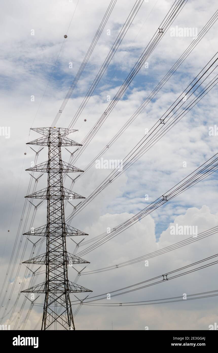Hight Voltage Pole and the Blue Sky with Clouds Stock Photo - Alamy