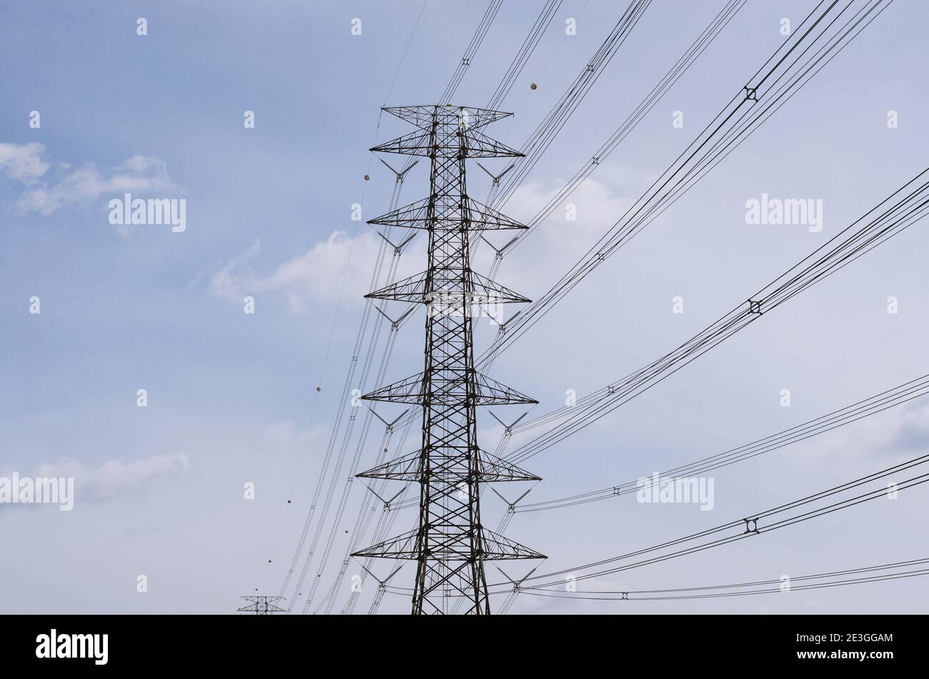 Hight Voltage Pole and the Blue Sky with Clouds Stock Photo - Alamy