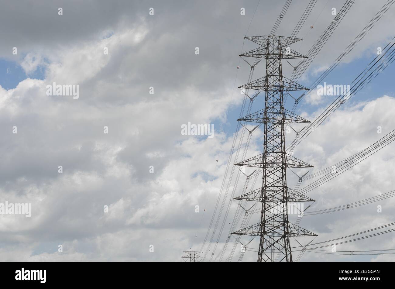 Hight Voltage Pole and the Blue Sky with Clouds Stock Photo - Alamy