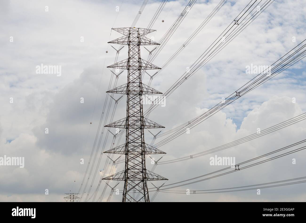 Hight Voltage Pole and the Blue Sky with Clouds Stock Photo - Alamy