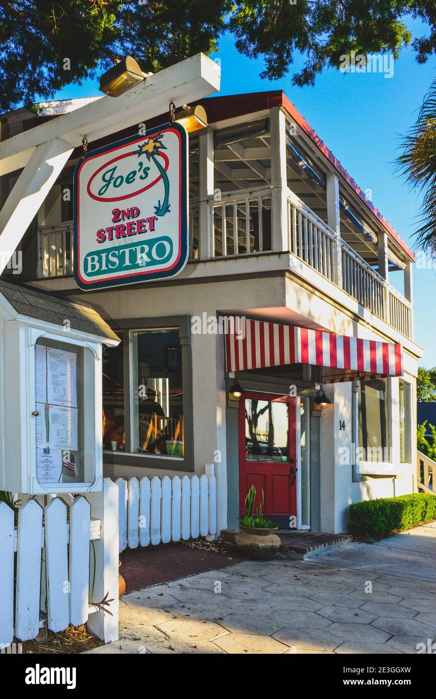 The old Florida style craftsman building with charming accents houses Joe's 2nd Street Bistro in Ferandina Beach, FL, on Amelia Ilsand Stock Photo