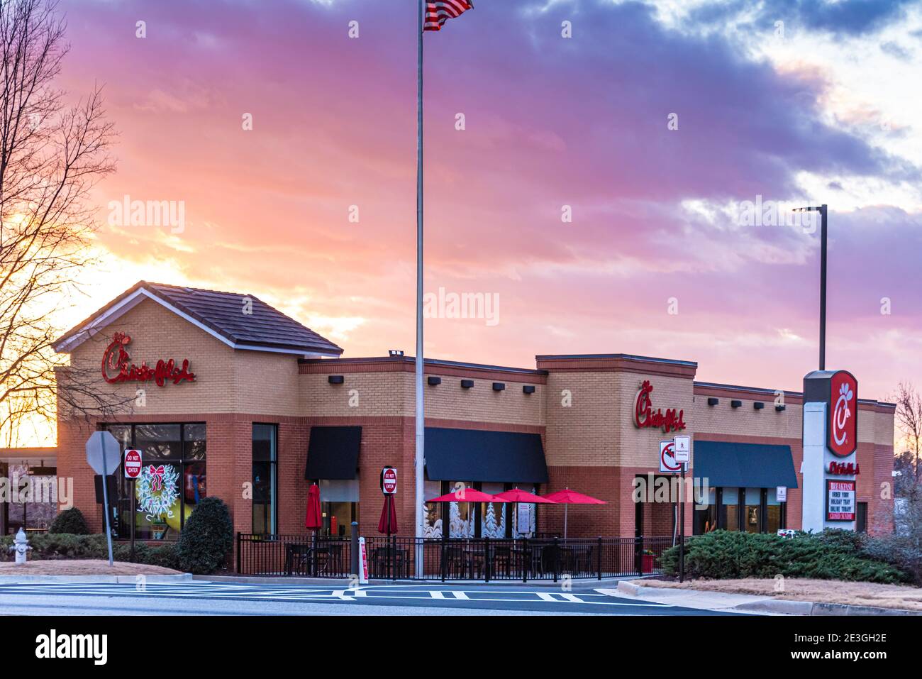 Chick-fil-A at sunset in Snellville, Georgia. The restaurant, normally swamped with customers, is shown on Sunday when Chick-fil-A is closed. (USA) Stock Photo