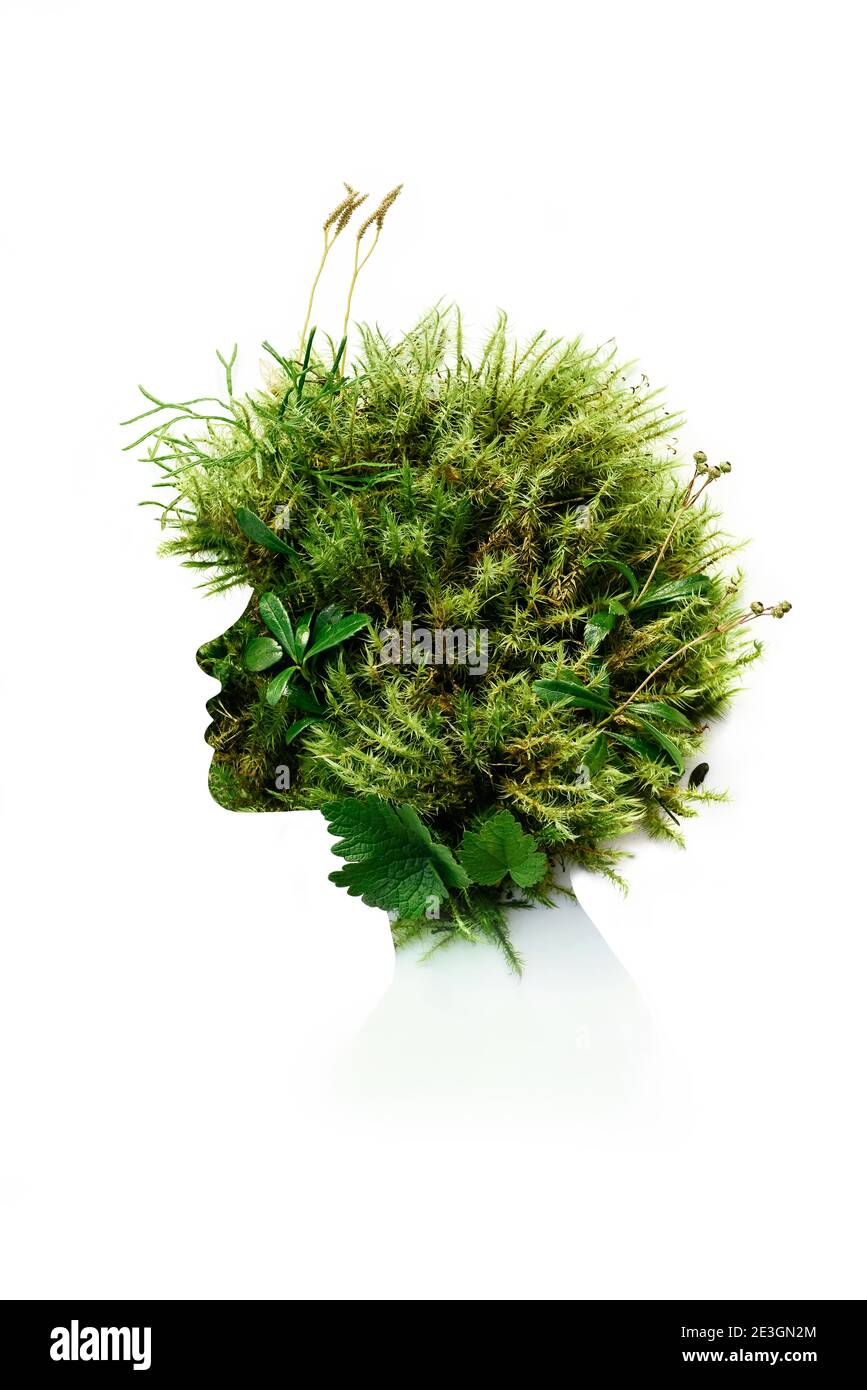 Double exposure Female profile of girl made from natural forest plants and moss Stock Photo