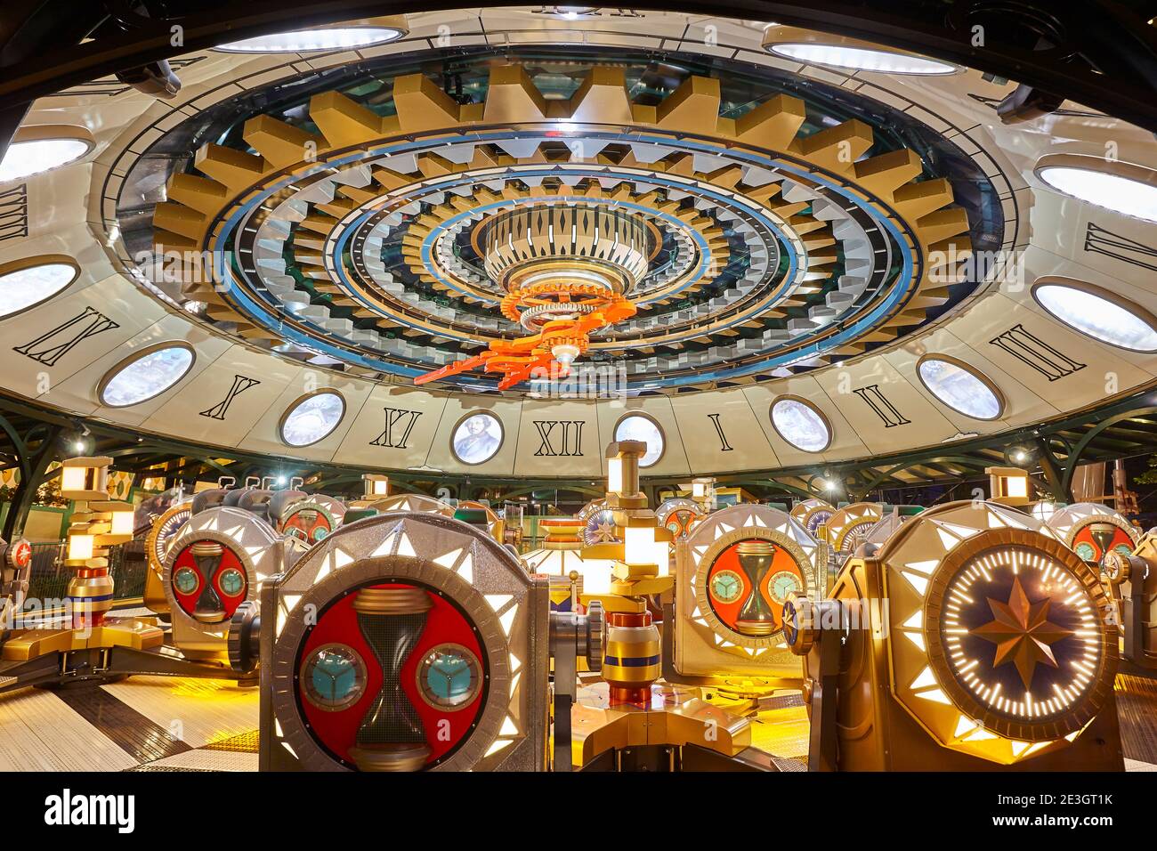 Huge clockwork mechanism hanging on the ceiling. Time equipment Stock