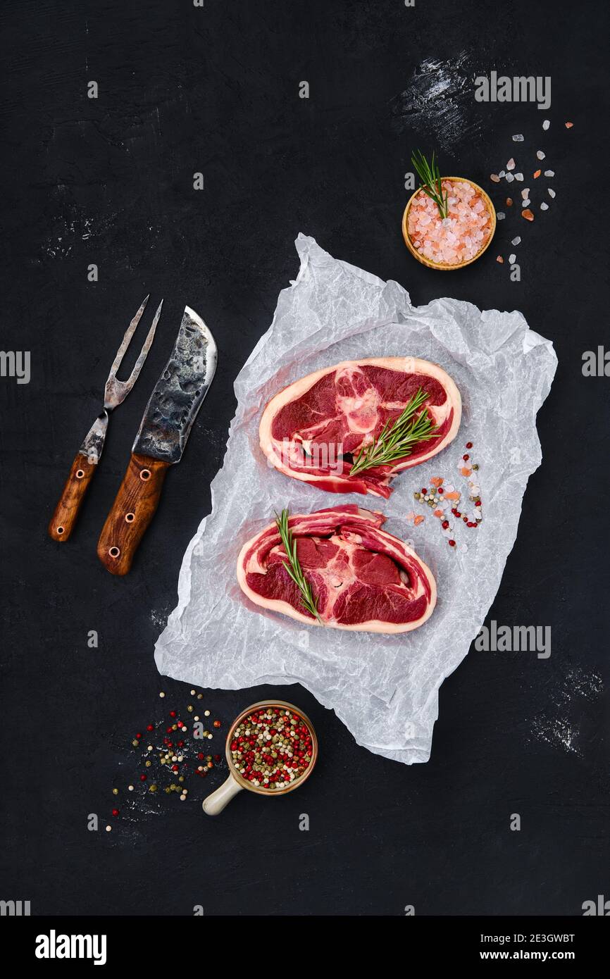 Raw lamb tail fat on wooden board Stock Photo - Alamy