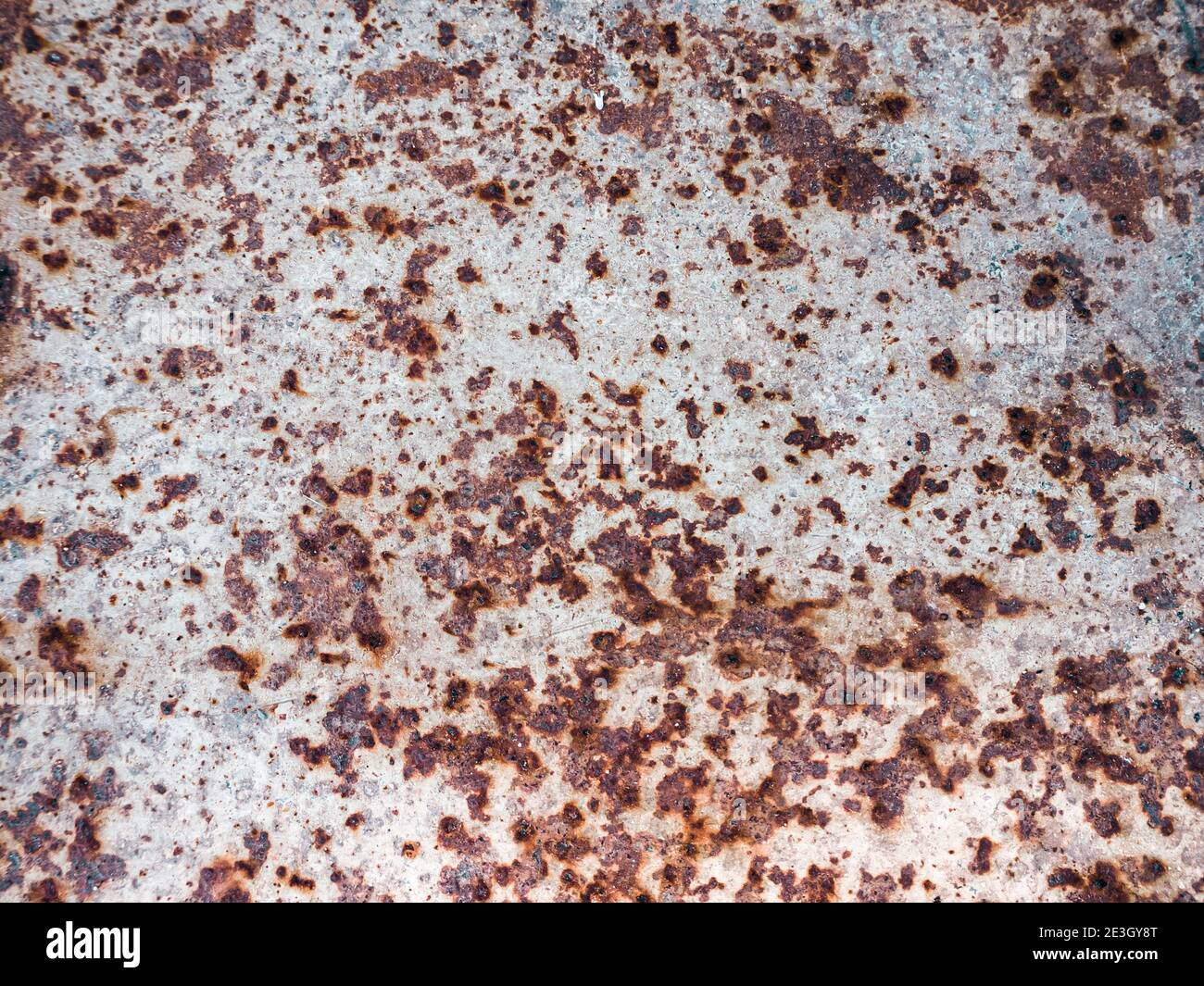 Worn rusty metal surface with cracking texture background Stock Photo ...