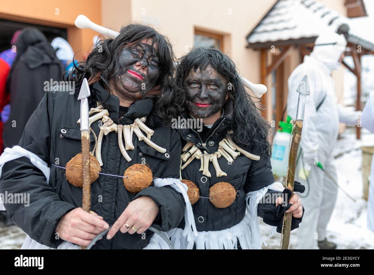 PUKLICE, CZECH REPUBLIC - FEBRUARY 29, 2020: Peoples in mask attend Masopust or the Mardi Gras carnival, traditional ceremonial door-to-door processio Stock Photo