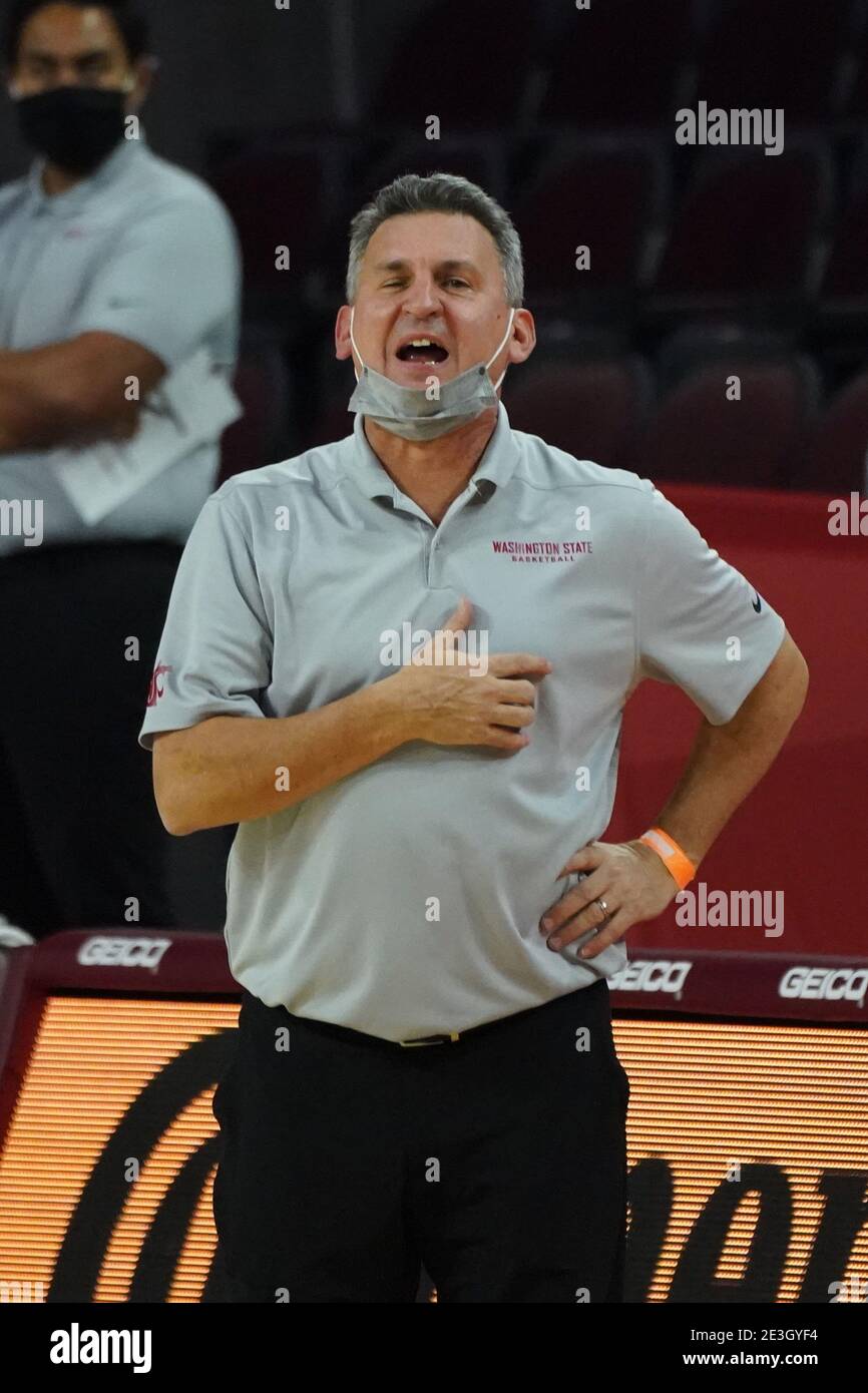 Washington State Cougars head coach Kyle Smith wears af face mask in the second half during an NCAA college basketball game against the Southern Calif Stock Photo