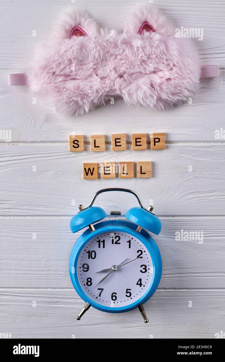 Alarm clock and sleep mask Stock Photo Alamy