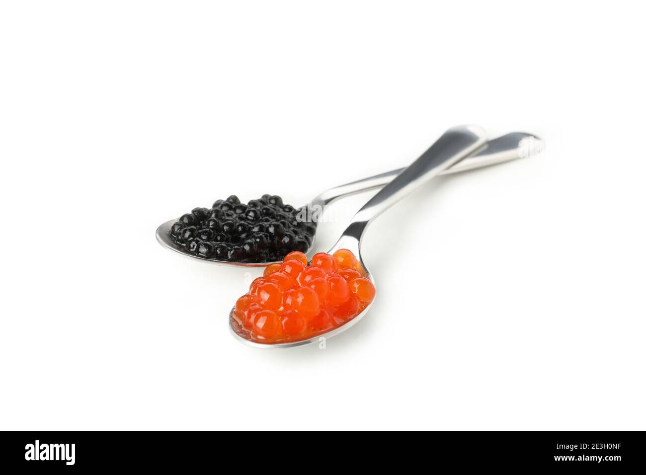 Spoons with black and red caviar isolated on white background Stock