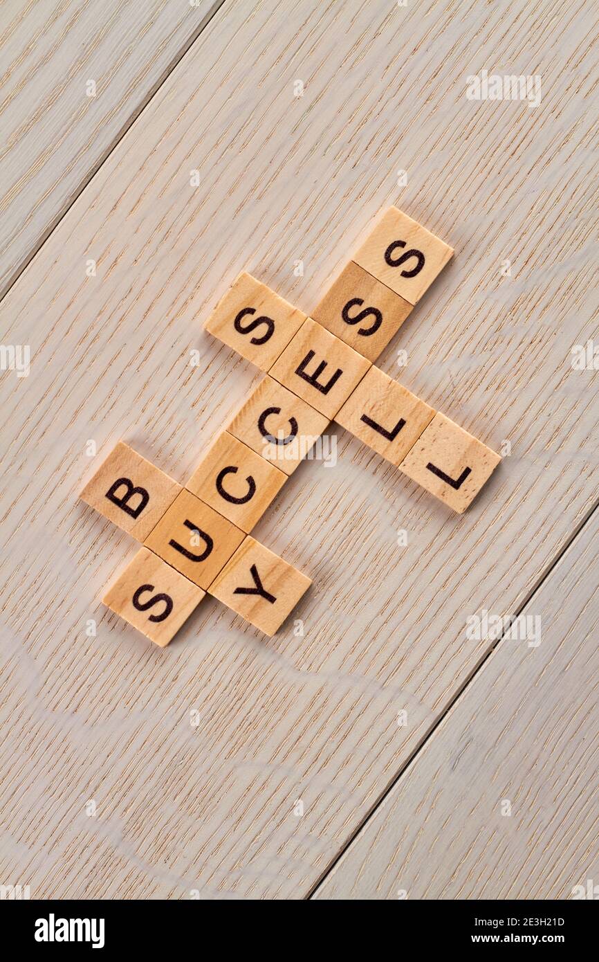 Market crossword building with wooden blocks Stock Photo Alamy