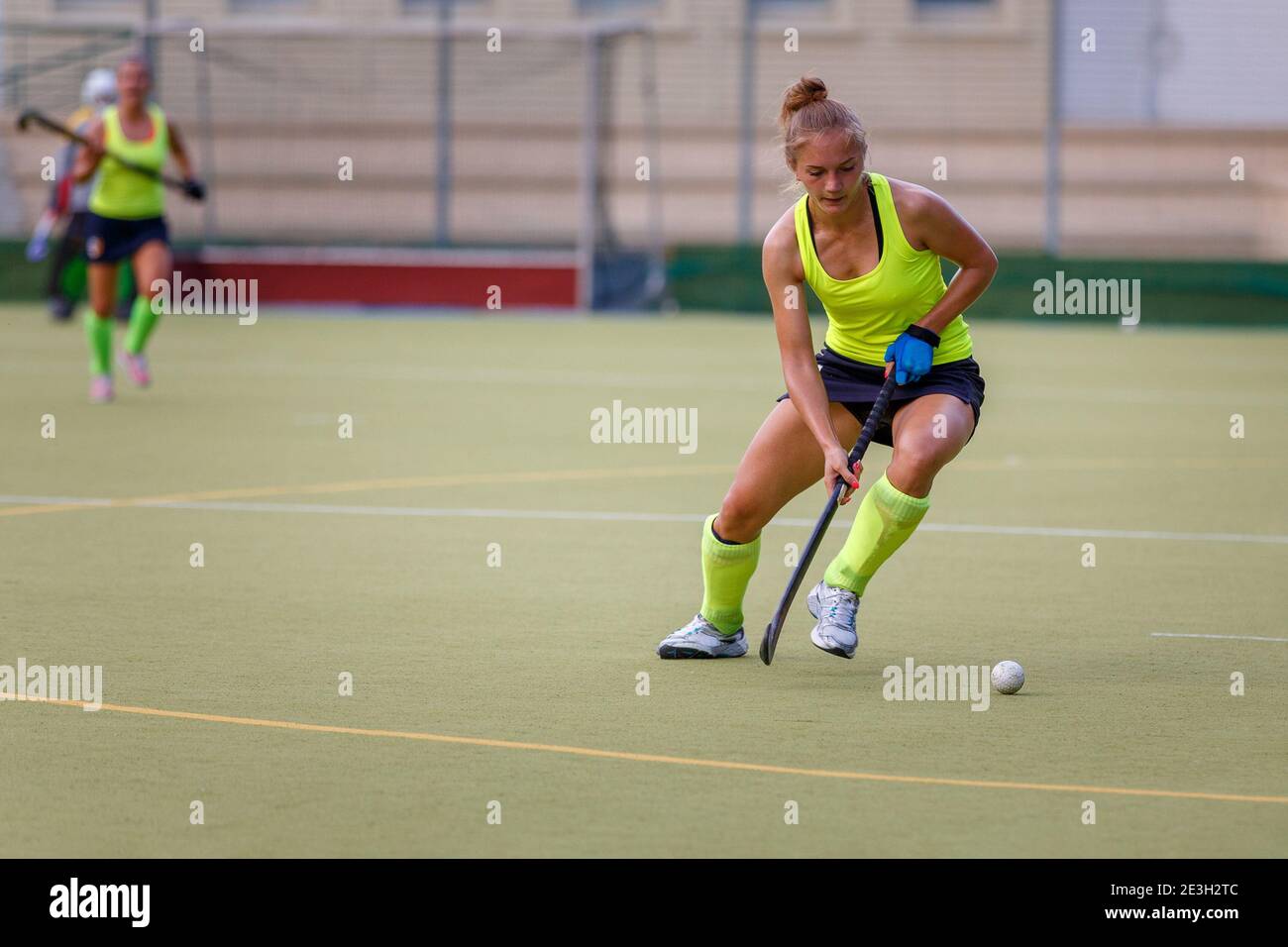 Young field hockey female player in attack Stock Photo Alamy