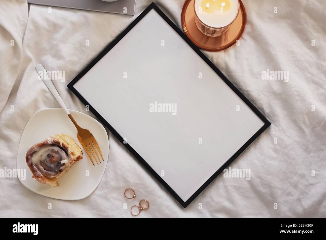 Empty frame with place for text and on the bed Stock Photo