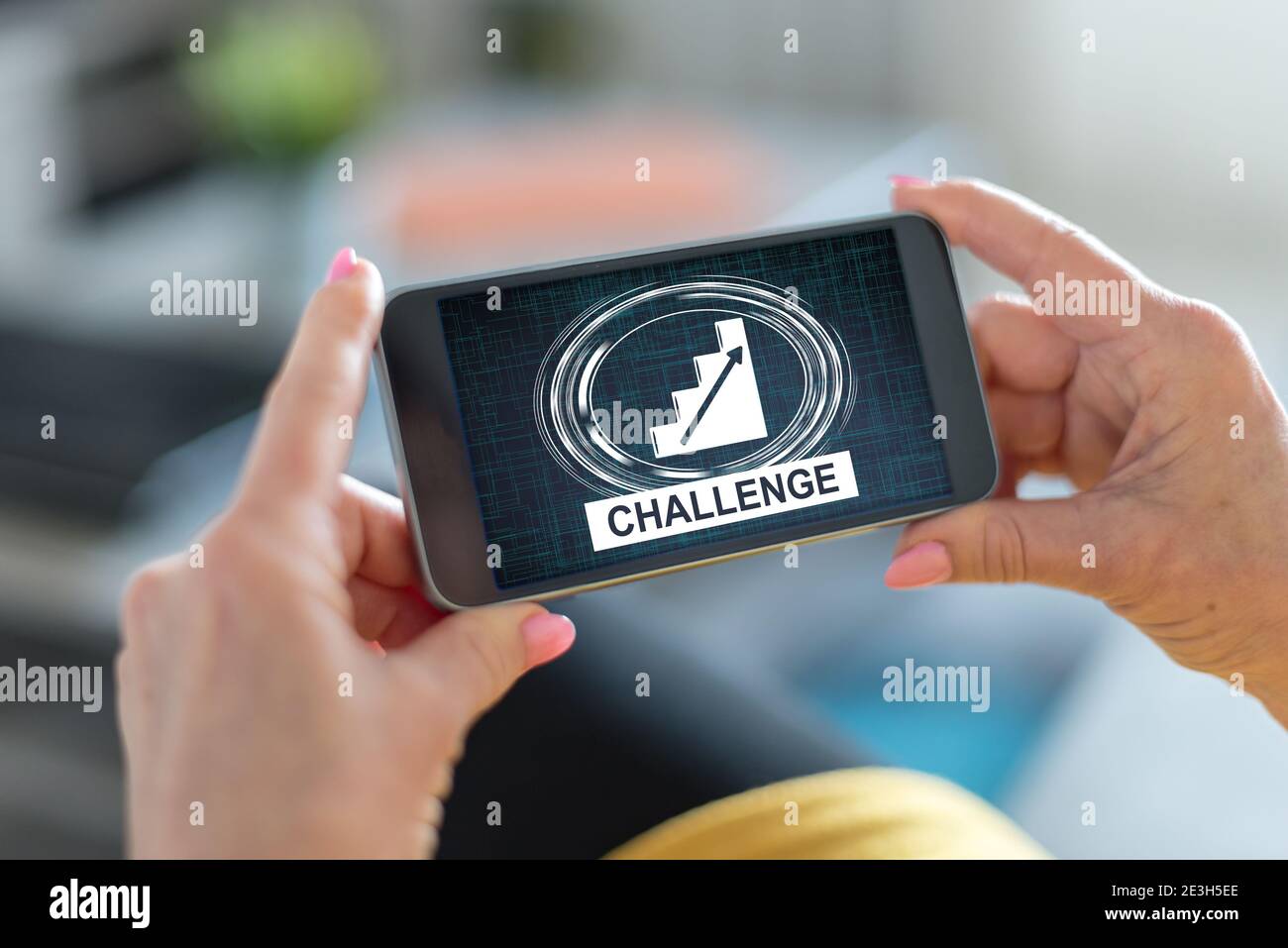 Smartphone screen displaying a challenge concept Stock Photo - Alamy