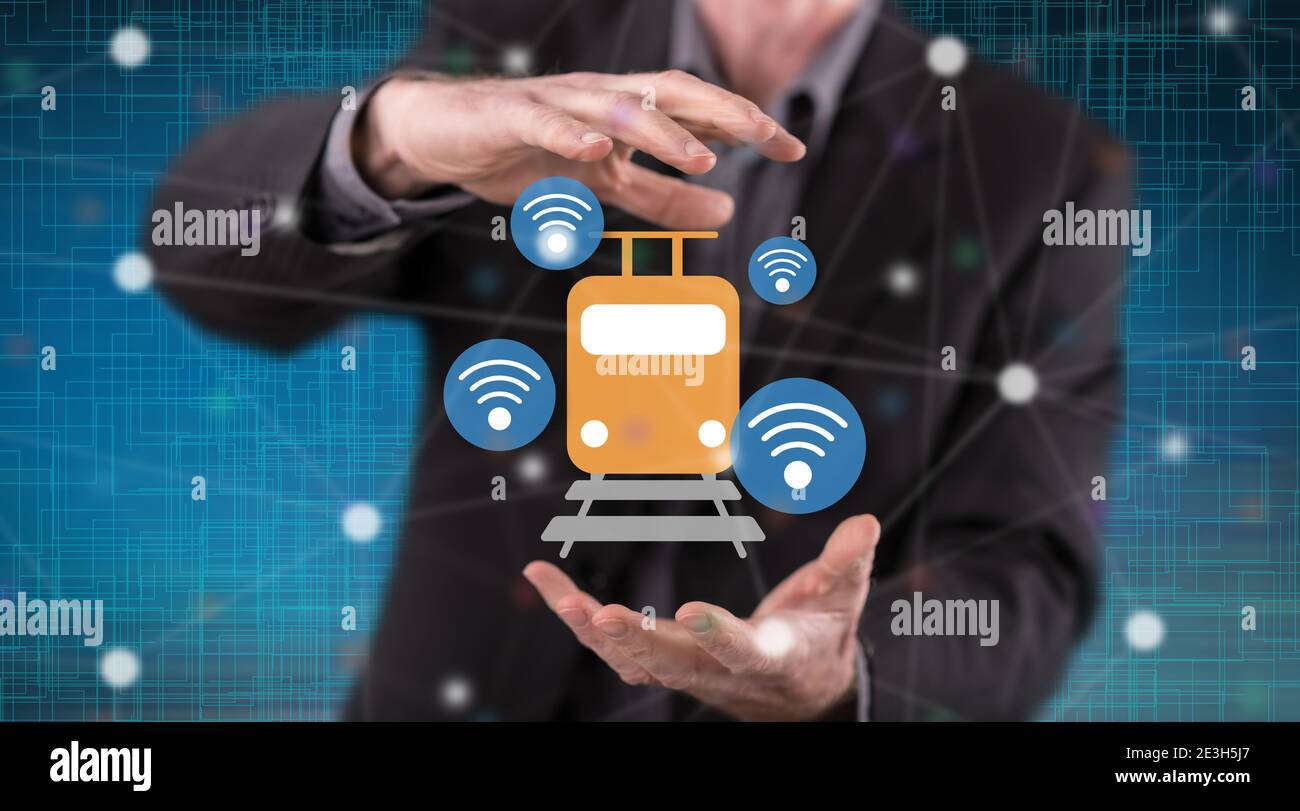 Smart train concept between hands of a man in background Stock Photo ...