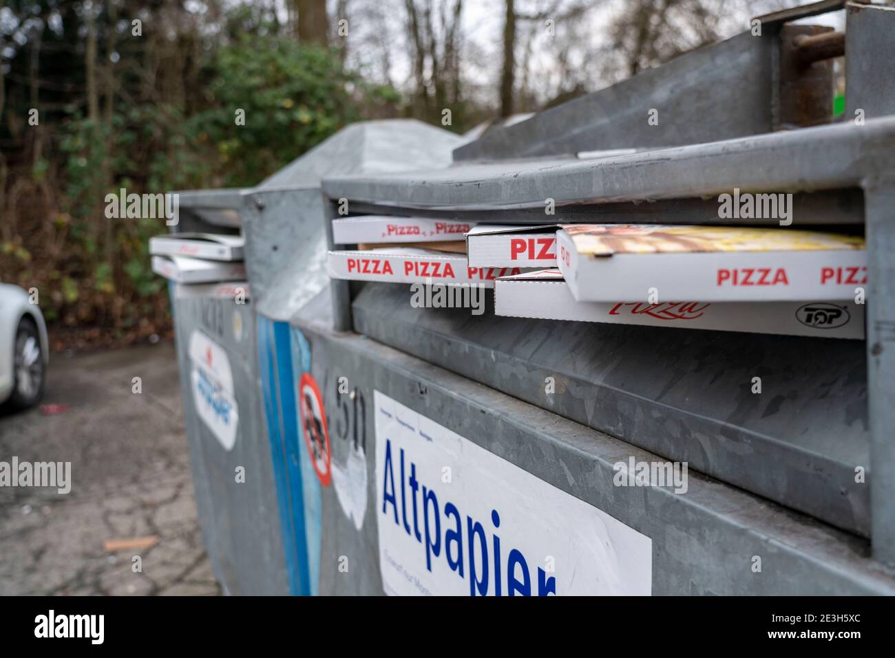 Empty, used pizza boxes, Take Away, in a full waste paper container, Stock Photo