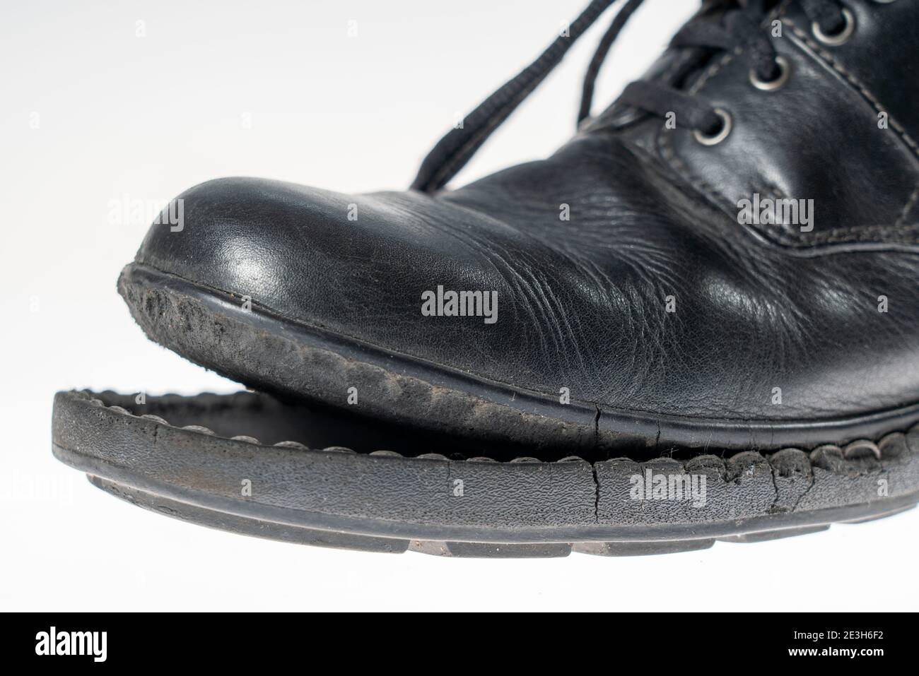 Shoe, with detached sole, Stock Photo