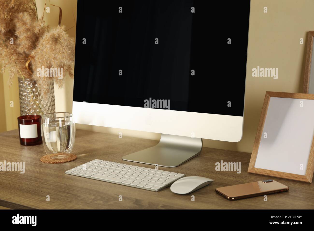 Concept of workplace with modern desktop computer on wooden table Stock ...
