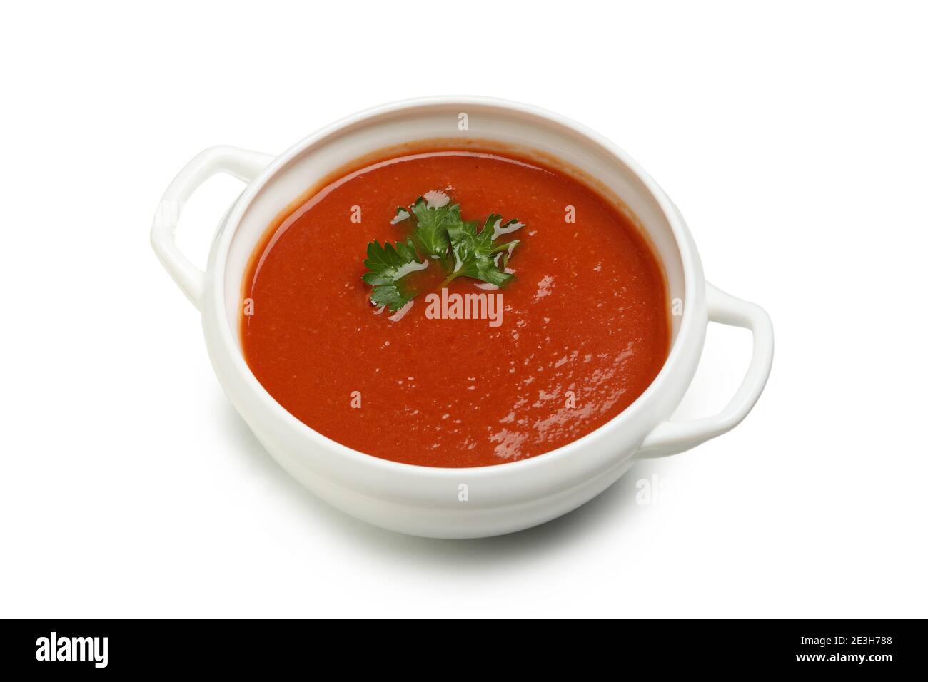 Bowl of tomato soup isolated on white background Stock Photo - Alamy