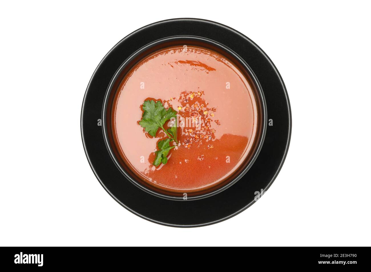 Bowl of tomato soup isolated on white background Stock Photo - Alamy