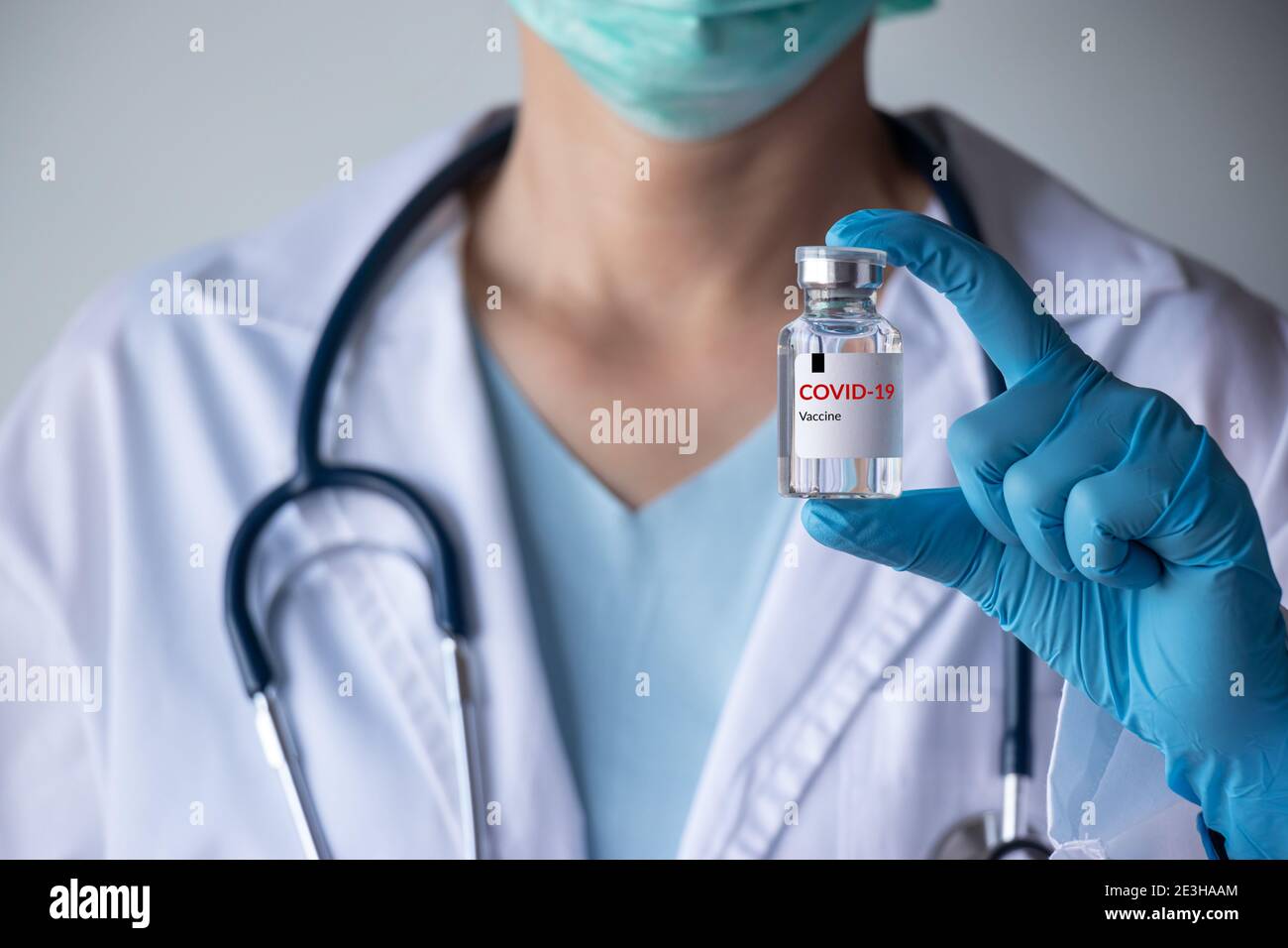 coronavirus COVID-19 vaccine and immunization concept. doctor hand holding vaccine bottle for injection use. corona virus prevent, treatment Stock Photo