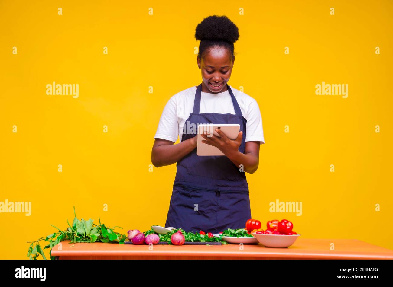 young pretty african cook feeling highly exhausted of her work Stock ...