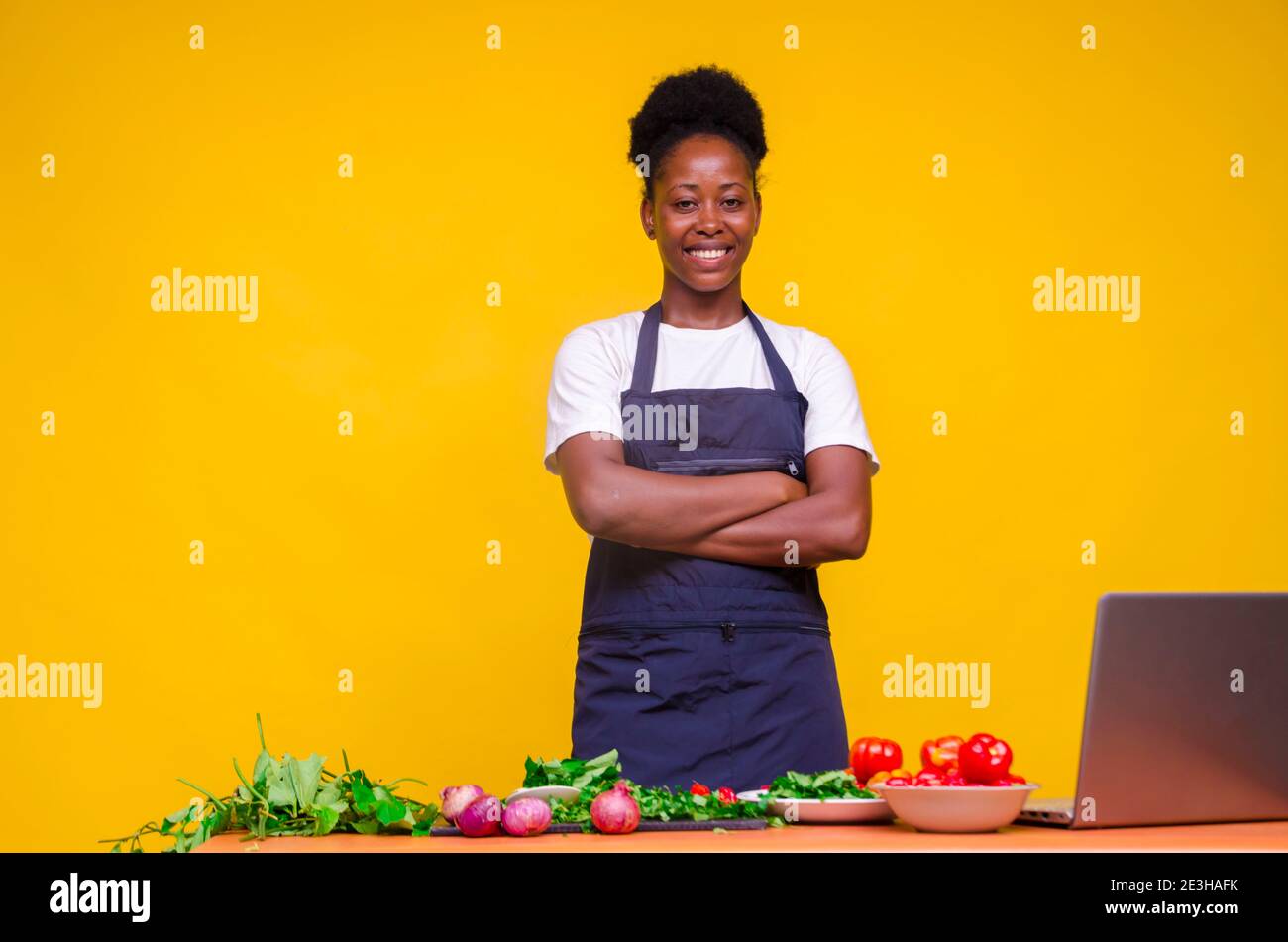 Nigerian woman cooking hi-res stock photography and images - Alamy