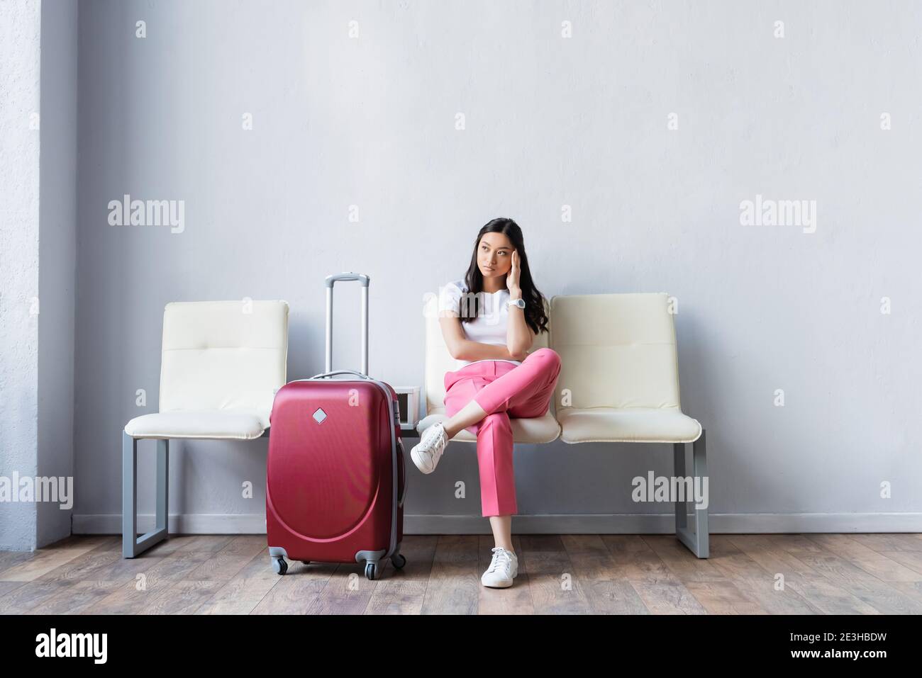 Woman suitcase in hall airport hi-res stock photography and images - Alamy