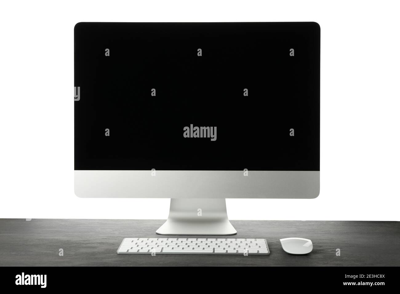 Computer, keyboard and mouse on wooden table isolated on white background Stock Photo