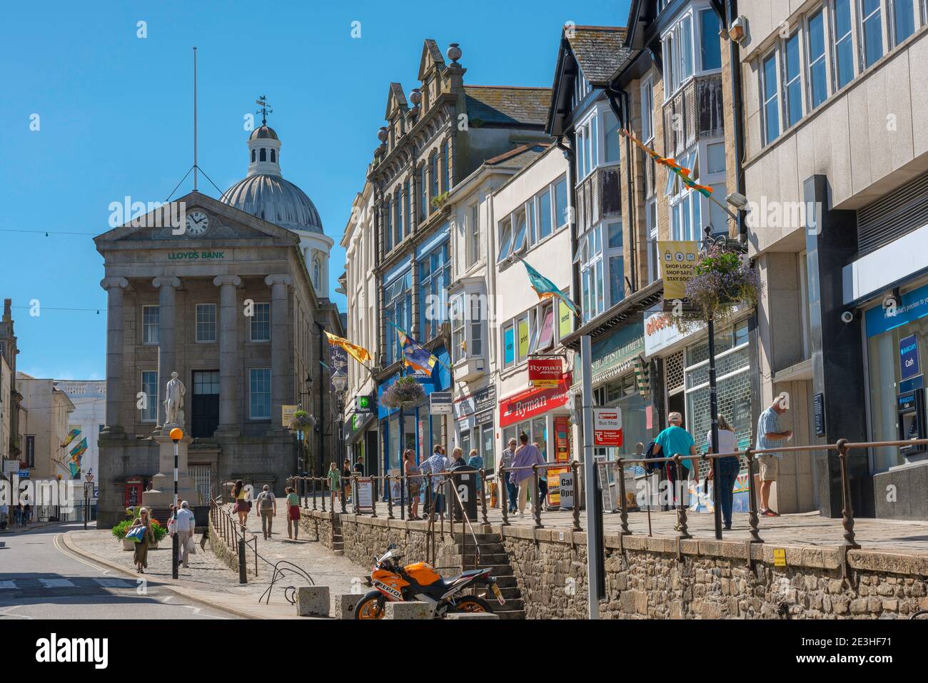 UK high street, view of traditional shops and stores in the High Street in Penzance, England, UK Stock Photo