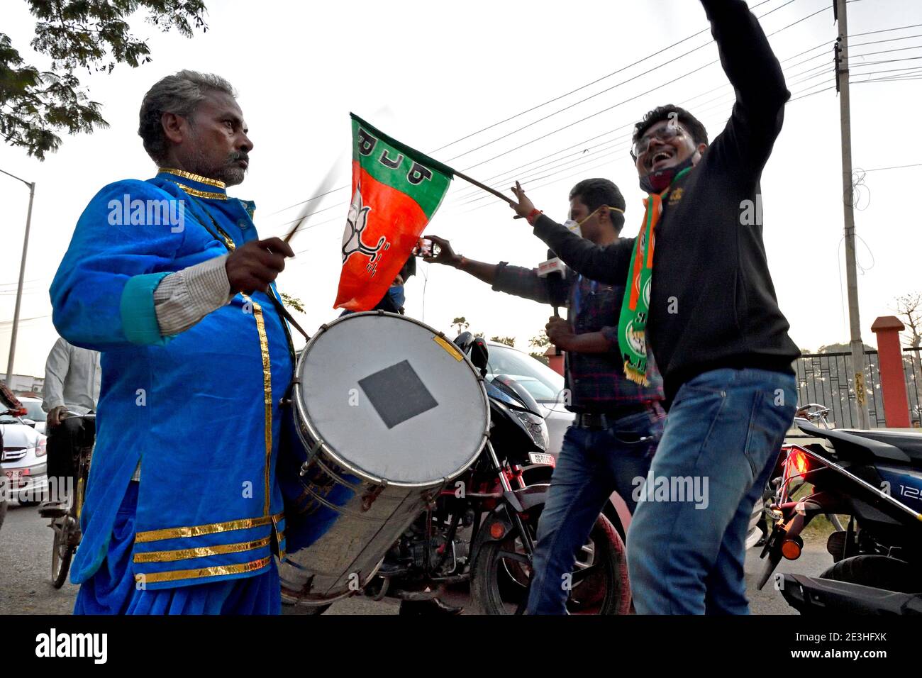 Party workers celebrating their victory in the state elections. Stock Photo