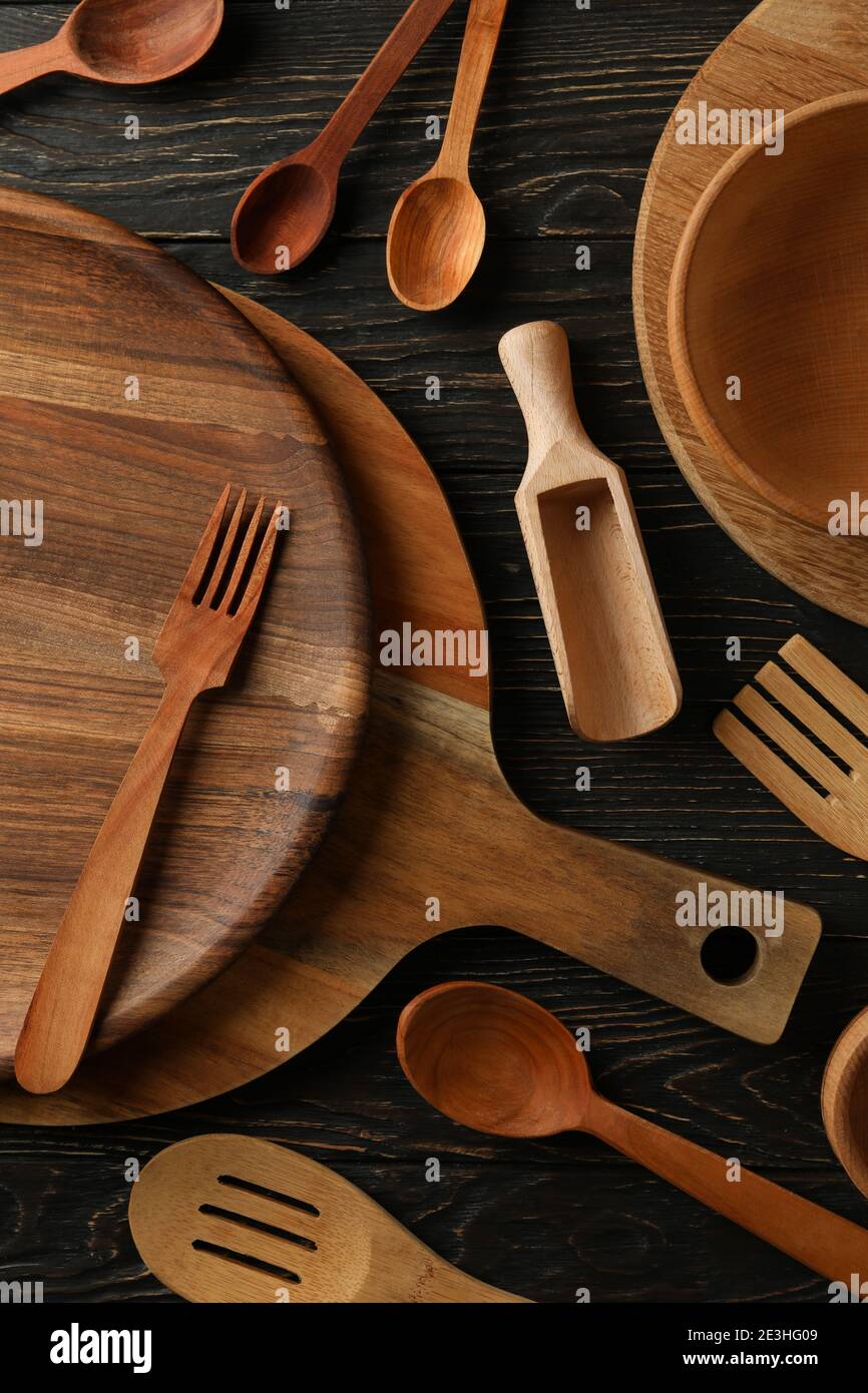 Different wooden kitchenware on wooden table, top view Stock Photo - Alamy